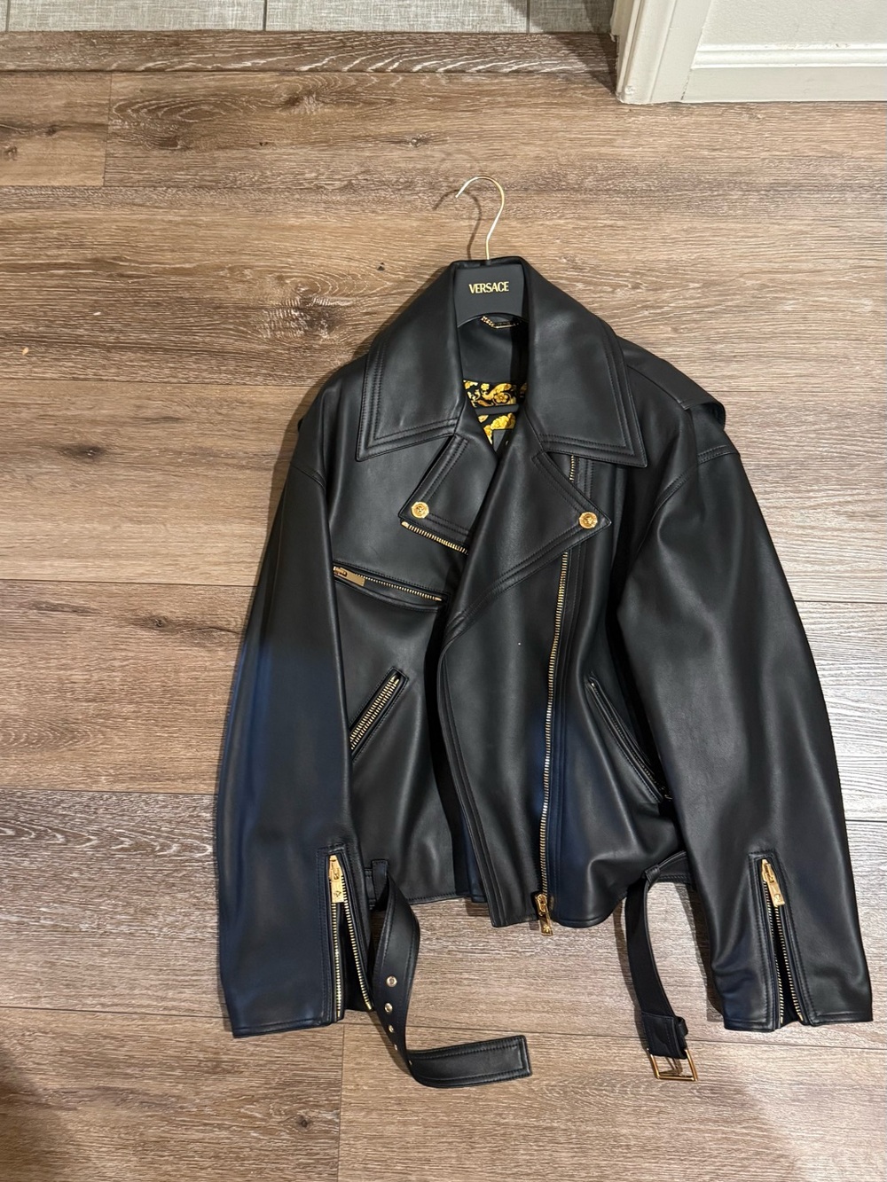 Versace Black Leather Biker Jacket with Gold Accents